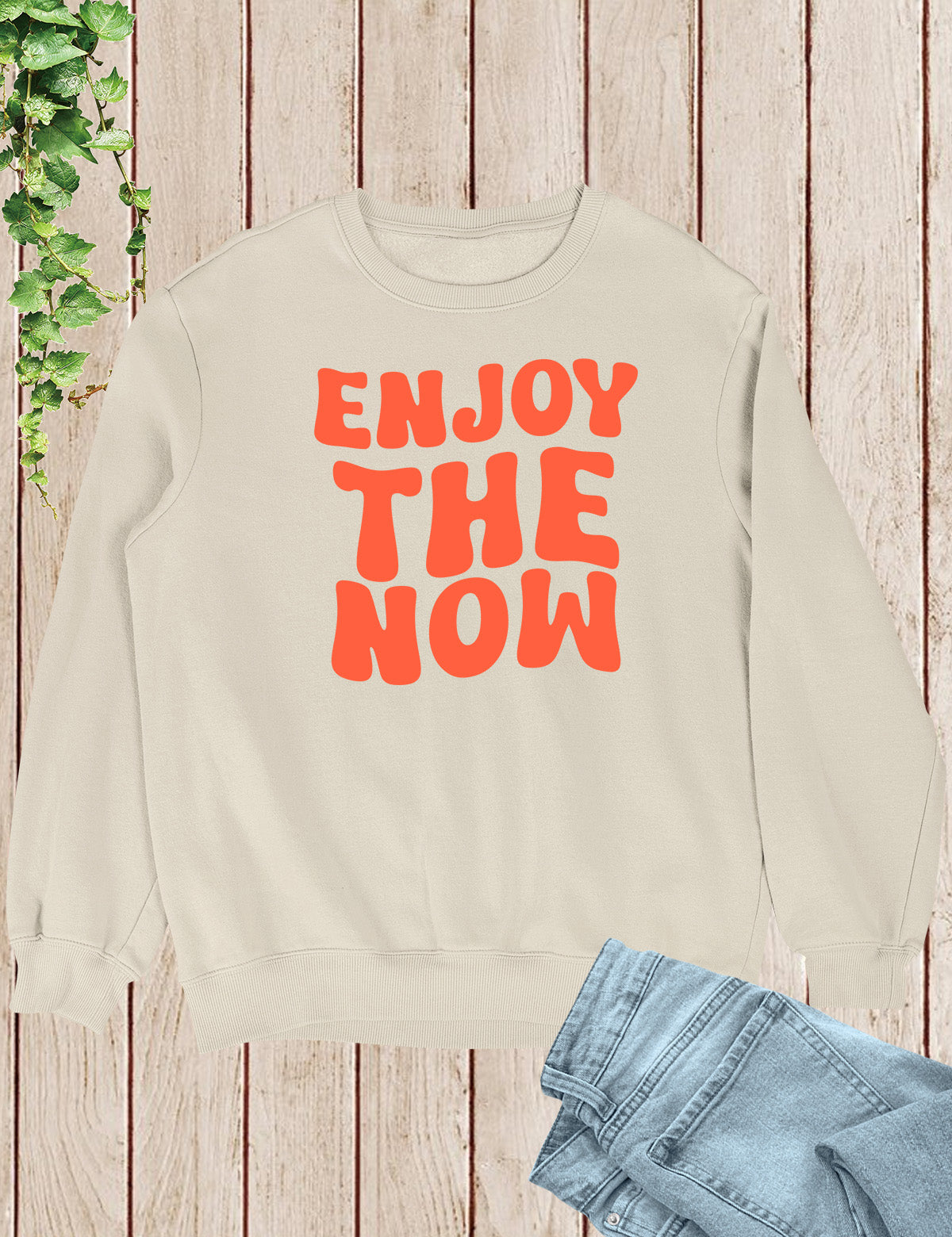 Embrace the present moment and spread joy with our 'Enjoy The Now' Funny Christian Sweatshirt, a delightful reminder to live life to the fullest in faith and laughter